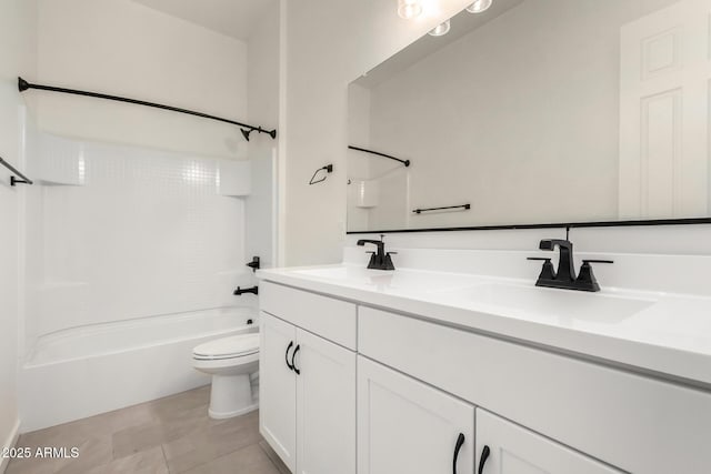 full bathroom with toilet, tile patterned floors, shower / tub combination, and vanity