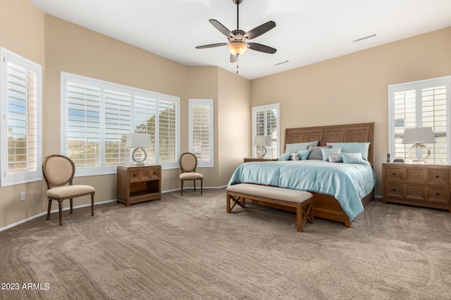 carpeted bedroom featuring ceiling fan