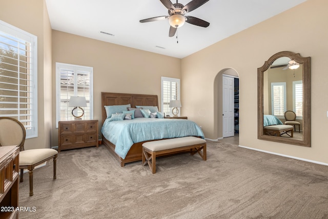 bedroom featuring ceiling fan and light colored carpet