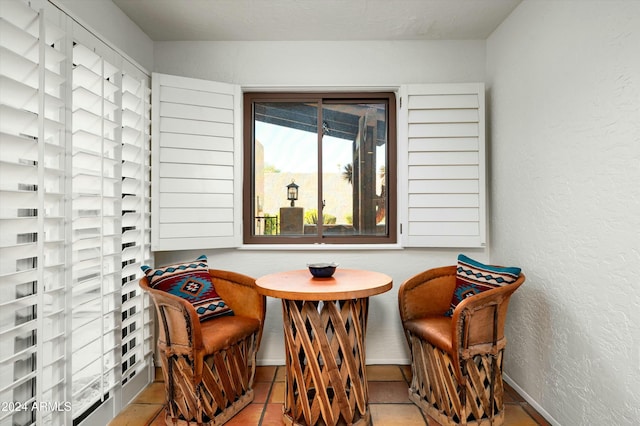 sitting room featuring light tile patterned floors