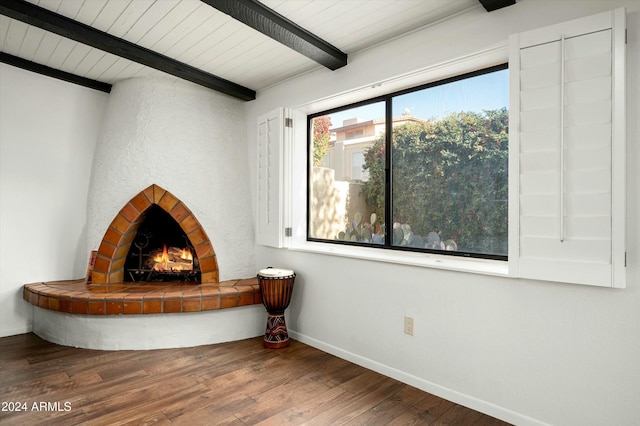 room details featuring wood-type flooring, wood ceiling, and beam ceiling