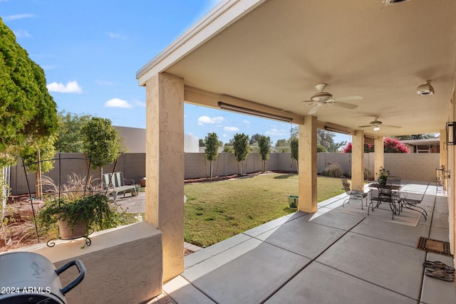 view of patio with ceiling fan