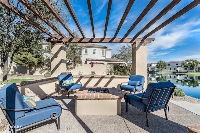 view of patio featuring an outdoor living space with a fire pit and a pergola