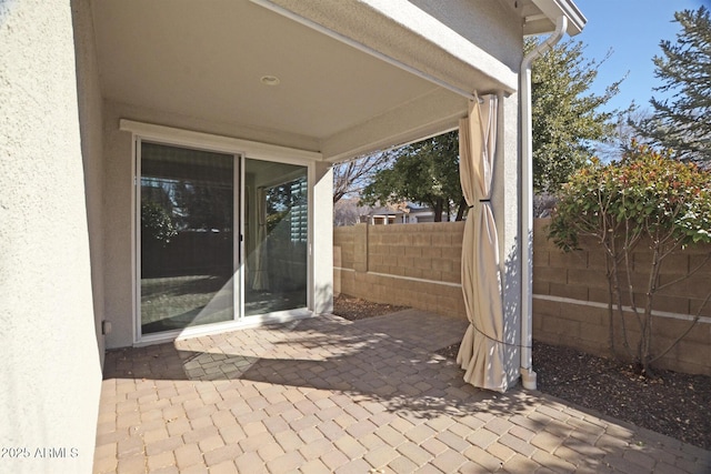 view of patio with fence