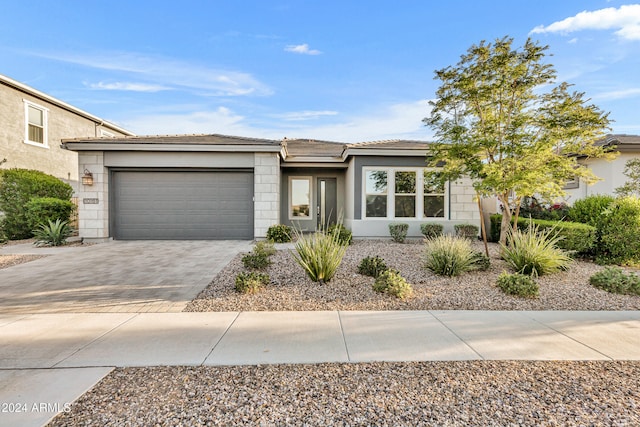 view of front of property featuring a garage