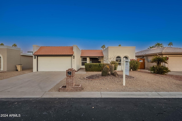 view of front of home featuring a garage