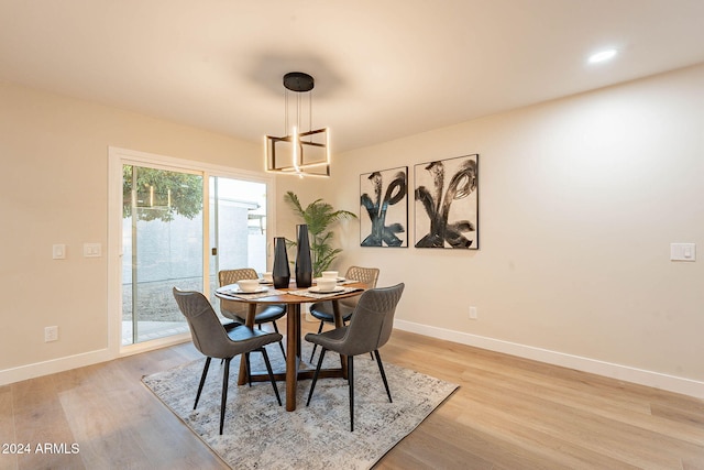 dining space with light wood-type flooring