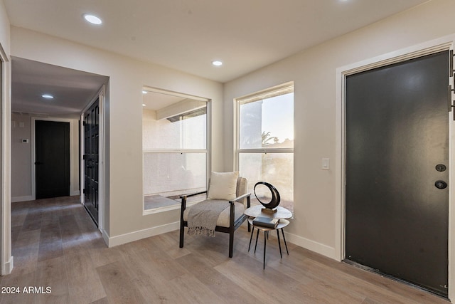 hallway featuring light wood-type flooring