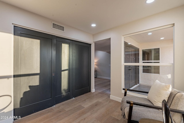 foyer entrance featuring light wood-type flooring