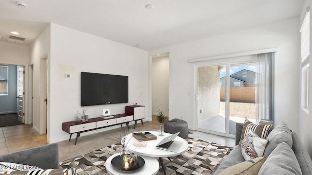 living room featuring light tile patterned floors