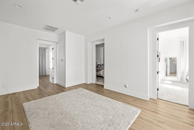 unfurnished bedroom featuring light hardwood / wood-style flooring