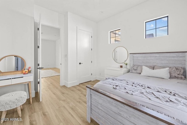 bedroom featuring light wood-type flooring