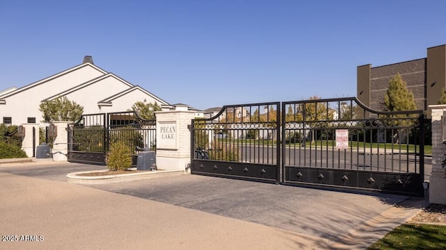 view of gate featuring central AC unit