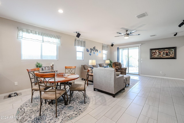 dining space featuring ceiling fan