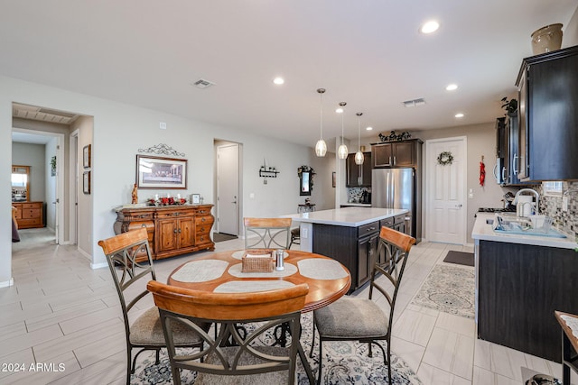 dining area featuring sink