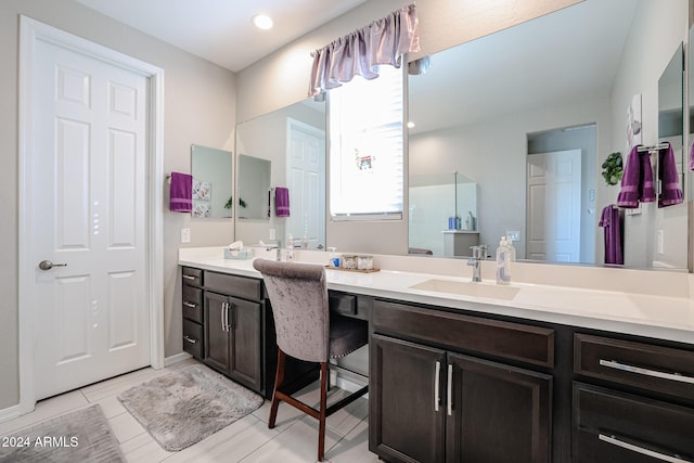 bathroom featuring vanity and tile patterned floors