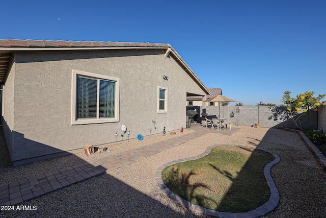 rear view of property with a patio area