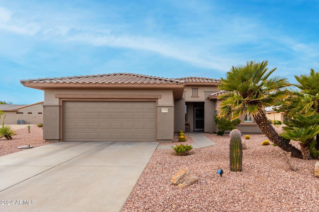 view of front of property featuring a garage