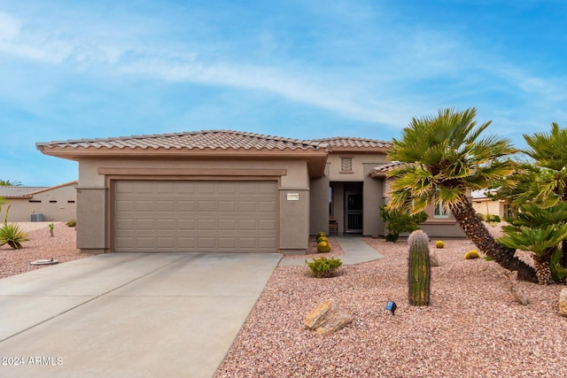 view of front of property featuring a garage