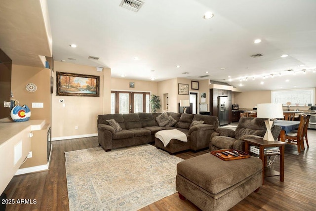 living room featuring dark wood-type flooring