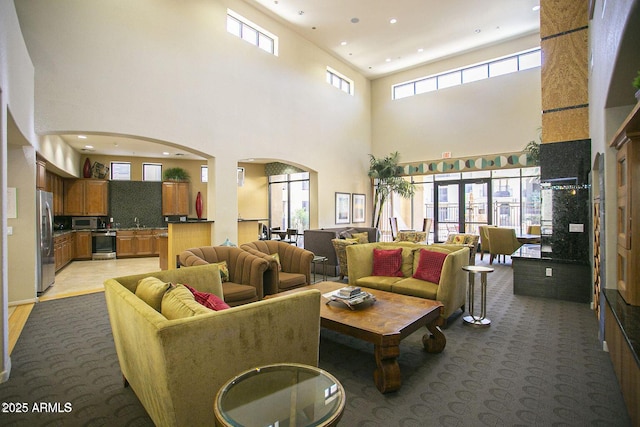 7601 E Indian Bend Rd Unit 1040, Scottsdale, AZ 85250 - community lobby with recessed lighting, a towering ceiling, and a sink