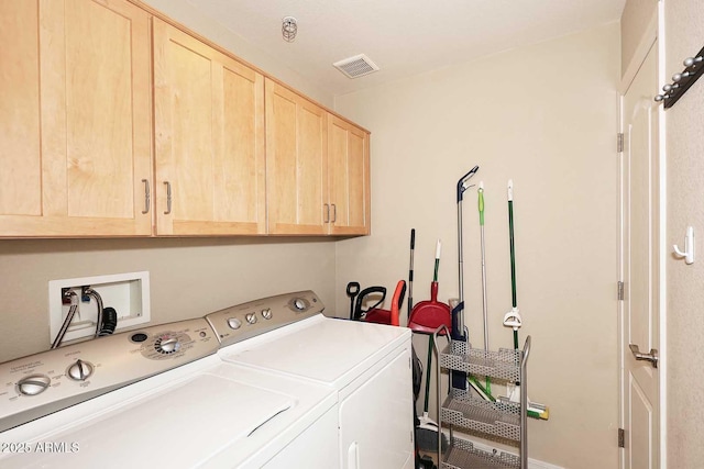 7601 E Indian Bend Rd Unit 1040, Scottsdale, AZ 85250 - laundry room featuring cabinet space and washing machine and dryer