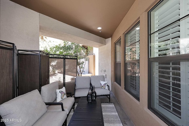 7601 E Indian Bend Rd Unit 1040, Scottsdale, AZ 85250 - view of patio / terrace with an outdoor living space and a balcony