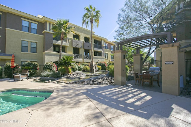 7601 E Indian Bend Rd Unit 1040, Scottsdale, AZ 85250 - community pool with a patio