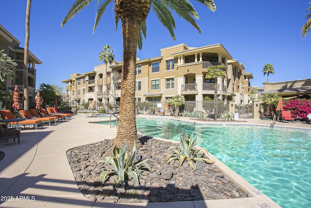 7601 E Indian Bend Rd Unit 1040, Scottsdale, AZ 85250 - community pool with a patio