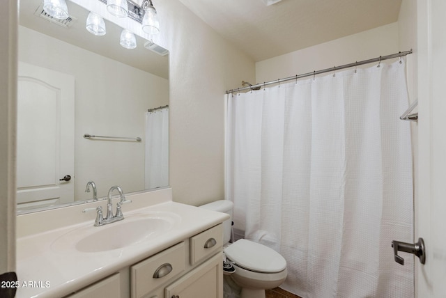 9998 W Prospector Dr, Queen Creek, AZ 85144 - bathroom featuring toilet and vanity