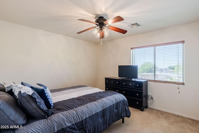 9998 W Prospector Dr, Queen Creek, AZ 85144 - bedroom featuring light colored carpet, baseboards, and ceiling fan