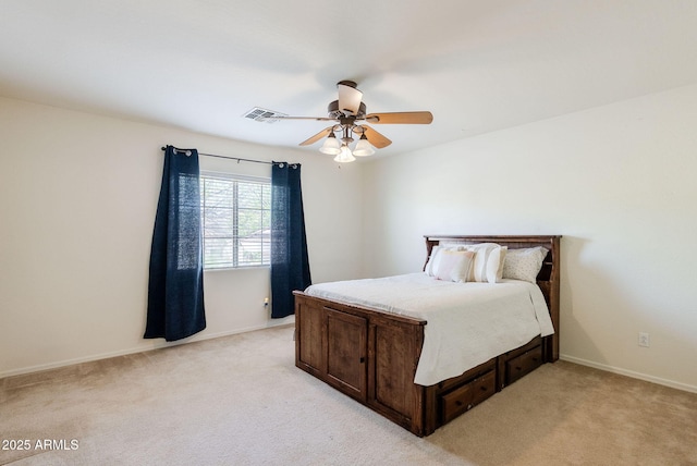 9998 W Prospector Dr, Queen Creek, AZ 85144 - bedroom with light carpet, baseboards, and ceiling fan