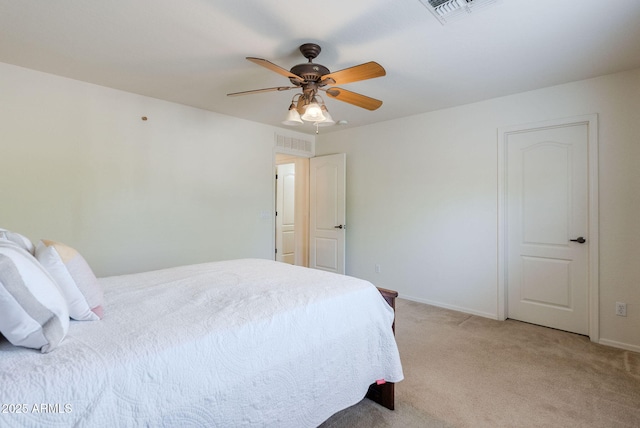 9998 W Prospector Dr, Queen Creek, AZ 85144 - bedroom featuring light carpet, baseboards, and a ceiling fan