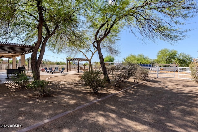 9998 W Prospector Dr, Queen Creek, AZ 85144 - view of community with a pergola, fence, and a gate