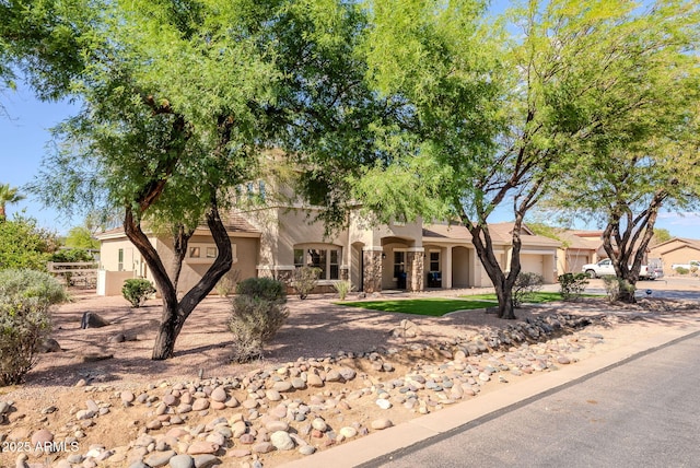 9998 W Prospector Dr, Queen Creek, AZ 85144 - view of front of home with stucco siding and a tiled roof