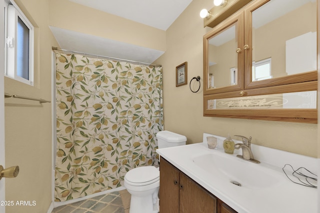 bathroom with a shower with curtain, vanity, and toilet