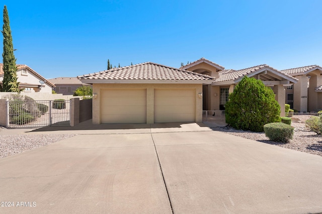 view of front of property featuring a garage