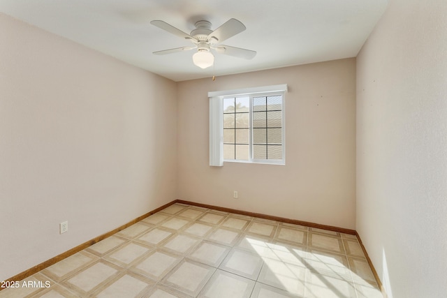 unfurnished room featuring light floors, a ceiling fan, and baseboards