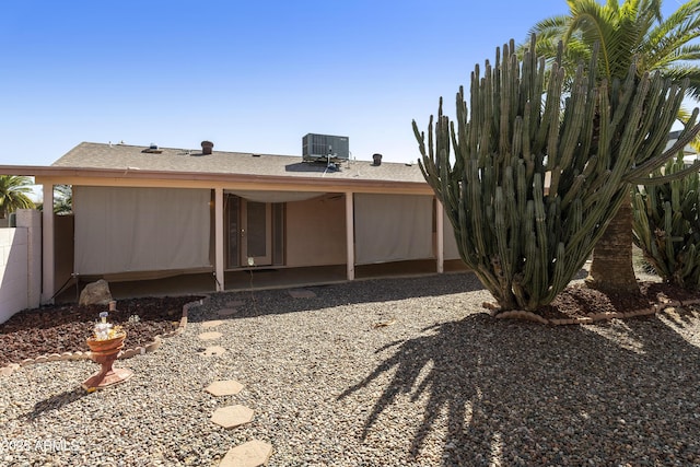 back of property featuring a patio, central air condition unit, and fence