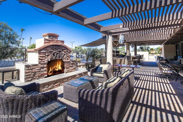 view of patio / terrace with an outdoor living space with a fireplace, outdoor dining area, and a pergola