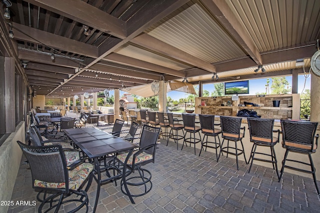 view of patio featuring outdoor dry bar