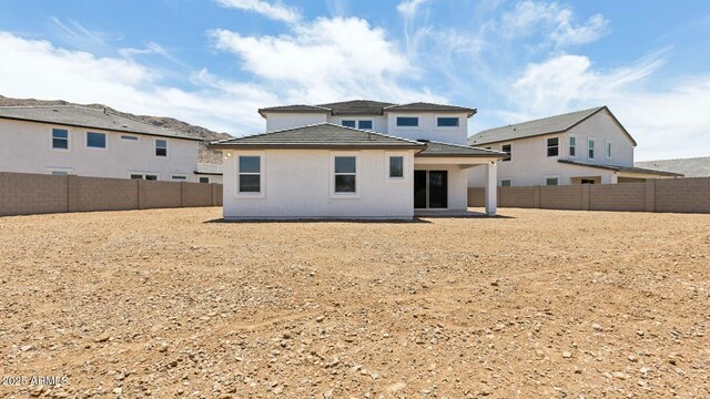 2316 W Moody Trl, Phoenix, AZ 85041 - back of property featuring a fenced backyard and a tiled roof