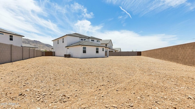 2316 W Moody Trl, Phoenix, AZ 85041 - back of property with a fenced backyard and central AC unit