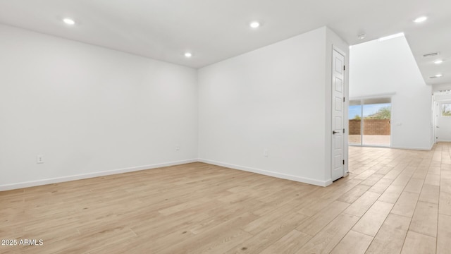 2316 W Moody Trl, Phoenix, AZ 85041 - unfurnished room with light wood finished floors, baseboards, and recessed lighting