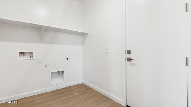 2316 W Moody Trl, Phoenix, AZ 85041 - laundry room featuring hookup for a gas dryer, hookup for an electric dryer, light wood finished floors, washer hookup, and baseboards