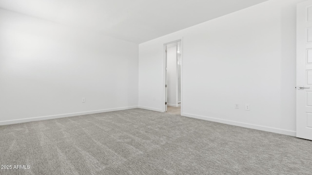 2316 W Moody Trl, Phoenix, AZ 85041 - unfurnished room with baseboards and light colored carpet