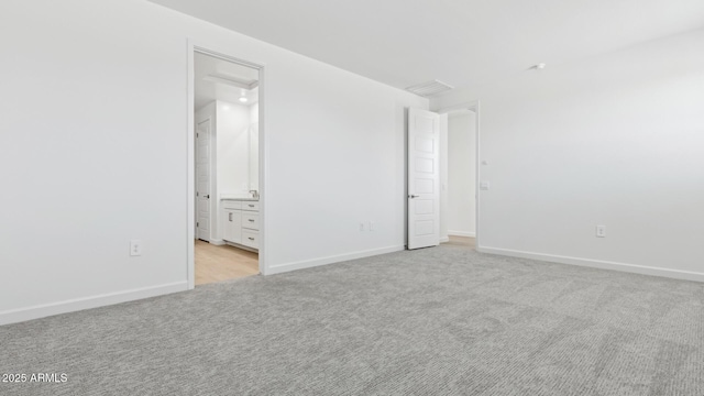 2316 W Moody Trl, Phoenix, AZ 85041 - empty room with light colored carpet and baseboards