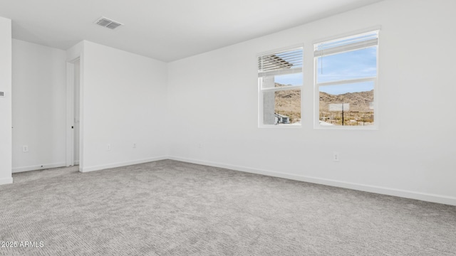 2316 W Moody Trl, Phoenix, AZ 85041 - empty room with baseboards and carpet flooring