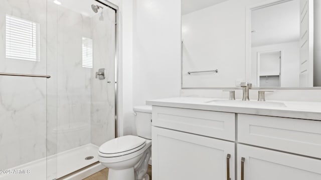 2316 W Moody Trl, Phoenix, AZ 85041 - bathroom with toilet, a marble finish shower, and vanity