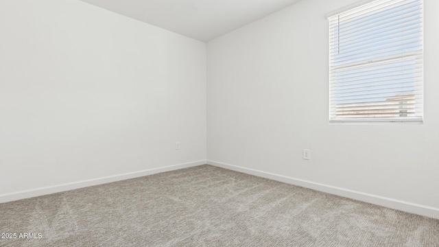 2316 W Moody Trl, Phoenix, AZ 85041 - unfurnished room with baseboards and carpet floors